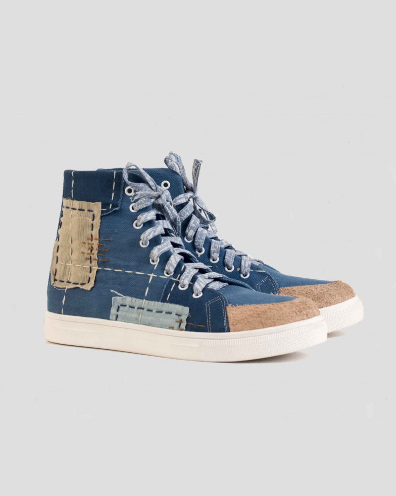 Threadapeutic: This sneaker made from natural canvas dyed with most iconic blue indigo vera plants. All sashiko(patchwork) was stitched by hand.